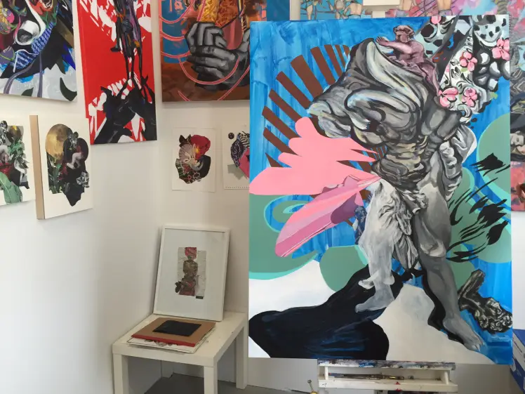 different modern paintings in an art studio