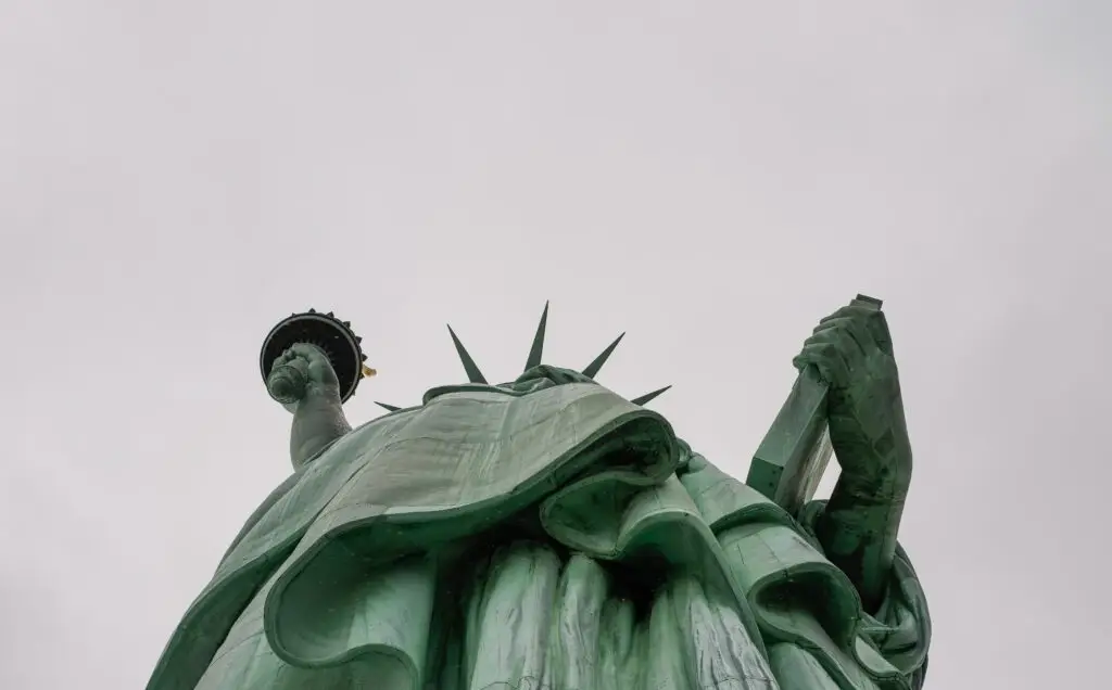 looking up at the Statue of Liberty