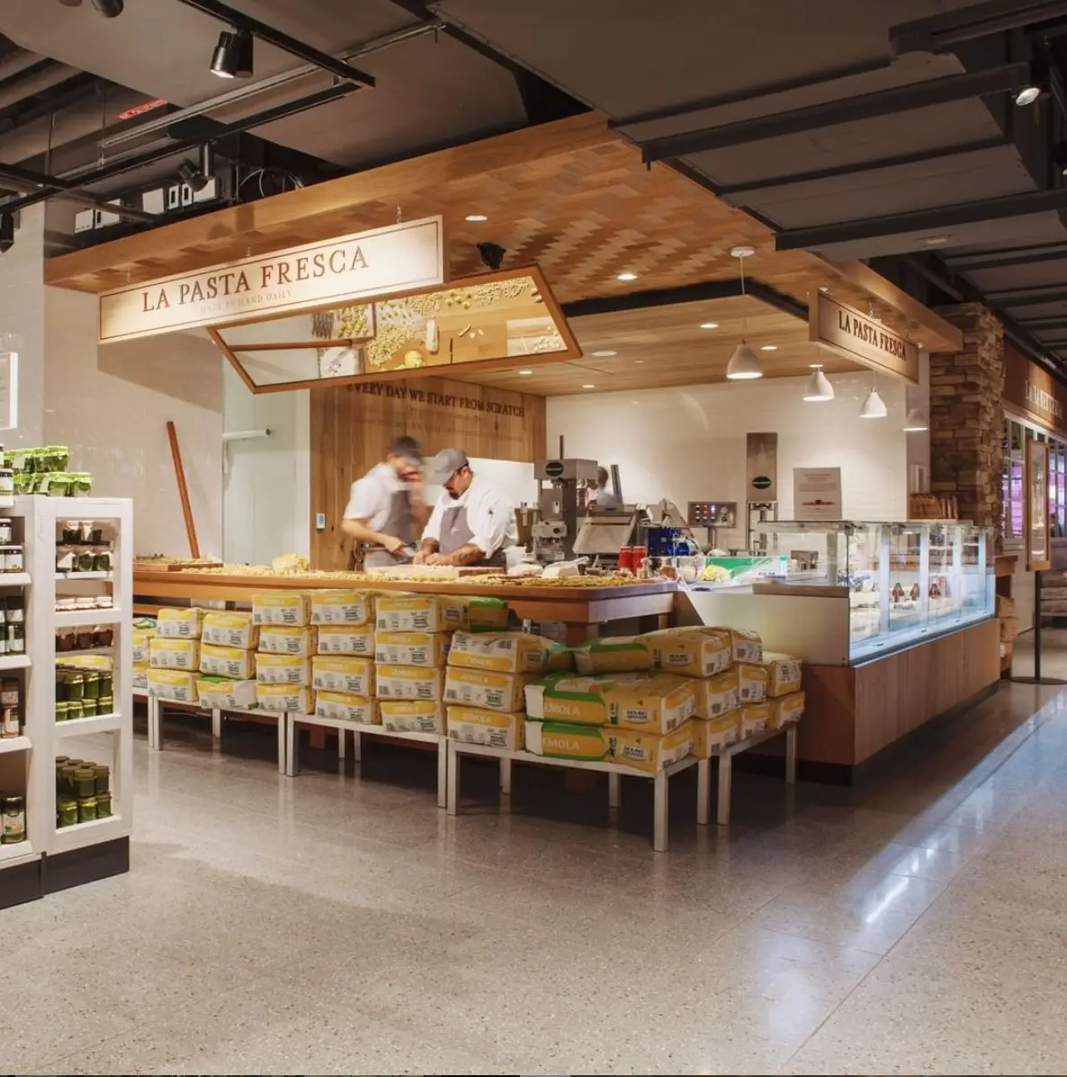 Flatiron Food, History & Architecture Tour to Relaunch in June! | Like A Local Tours a group of people in a room