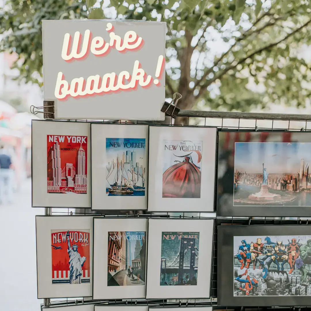 stand selling photos of nyc to tourists