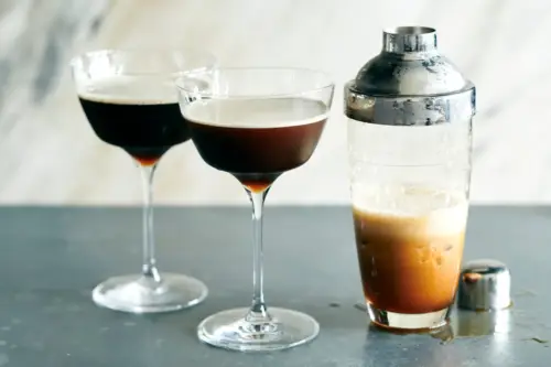 two martinis glasses and a shaker