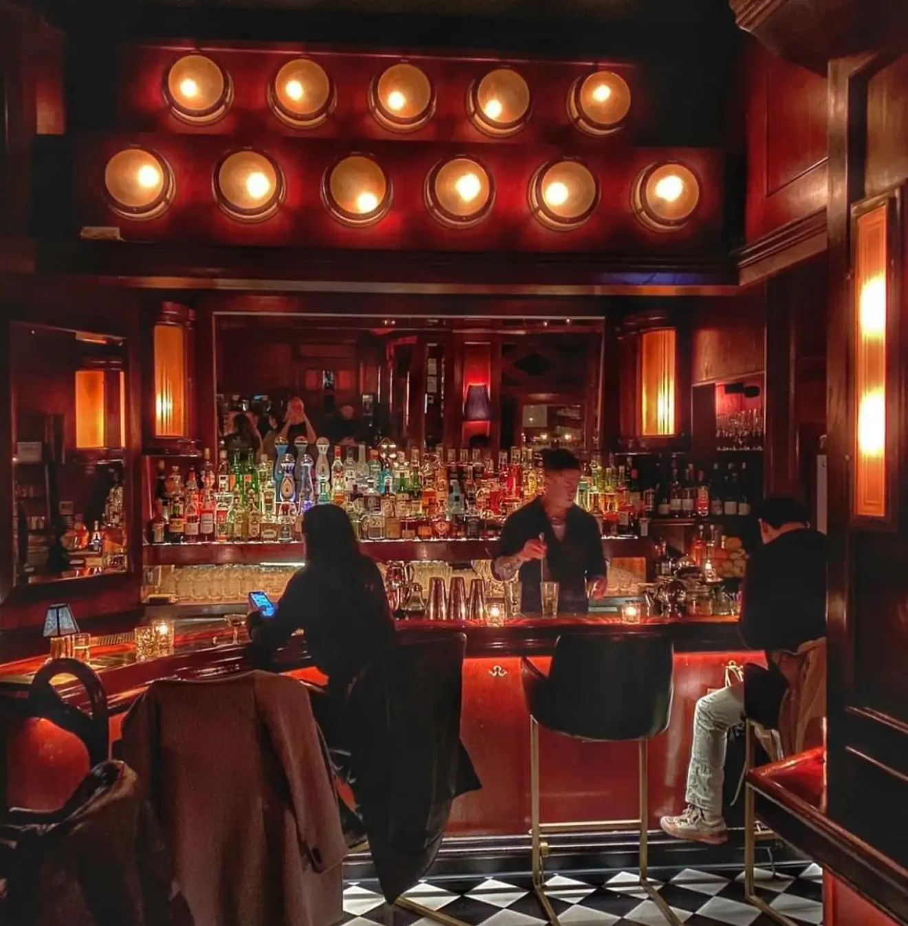 a person sitting at a bar
