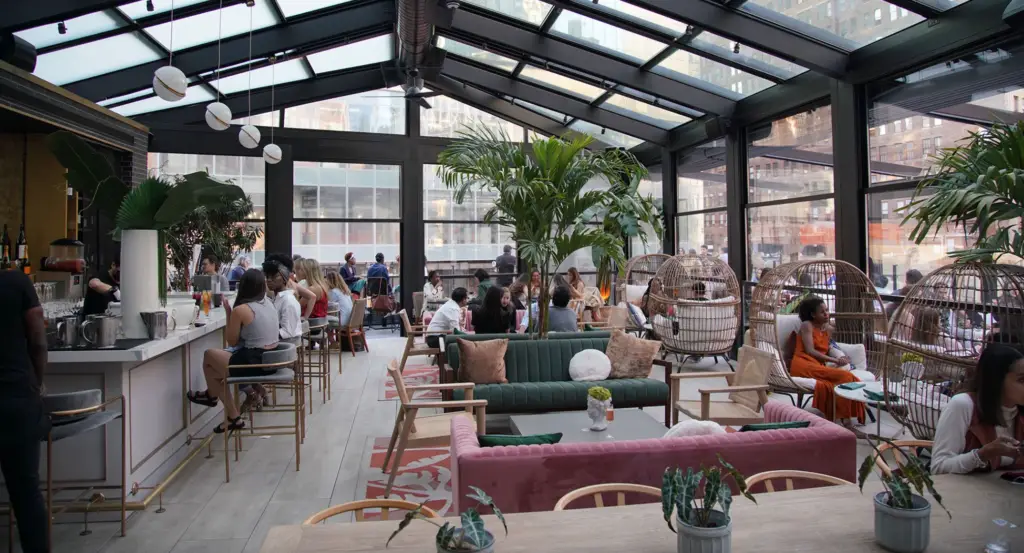 restaurant with bar and a glass ceiling
