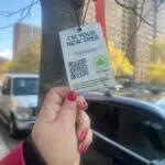 a person holding a sign