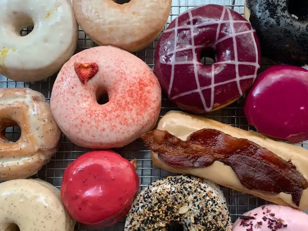 a box filled with different kinds of donuts