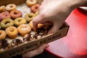 a close up of a box of donuts