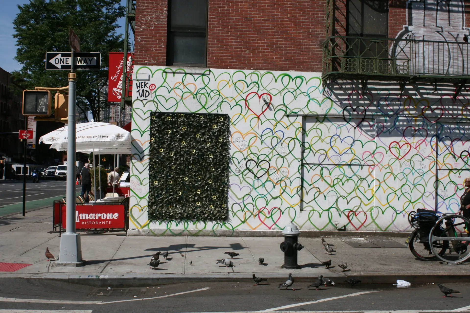 a bicycle parked on the side of a building