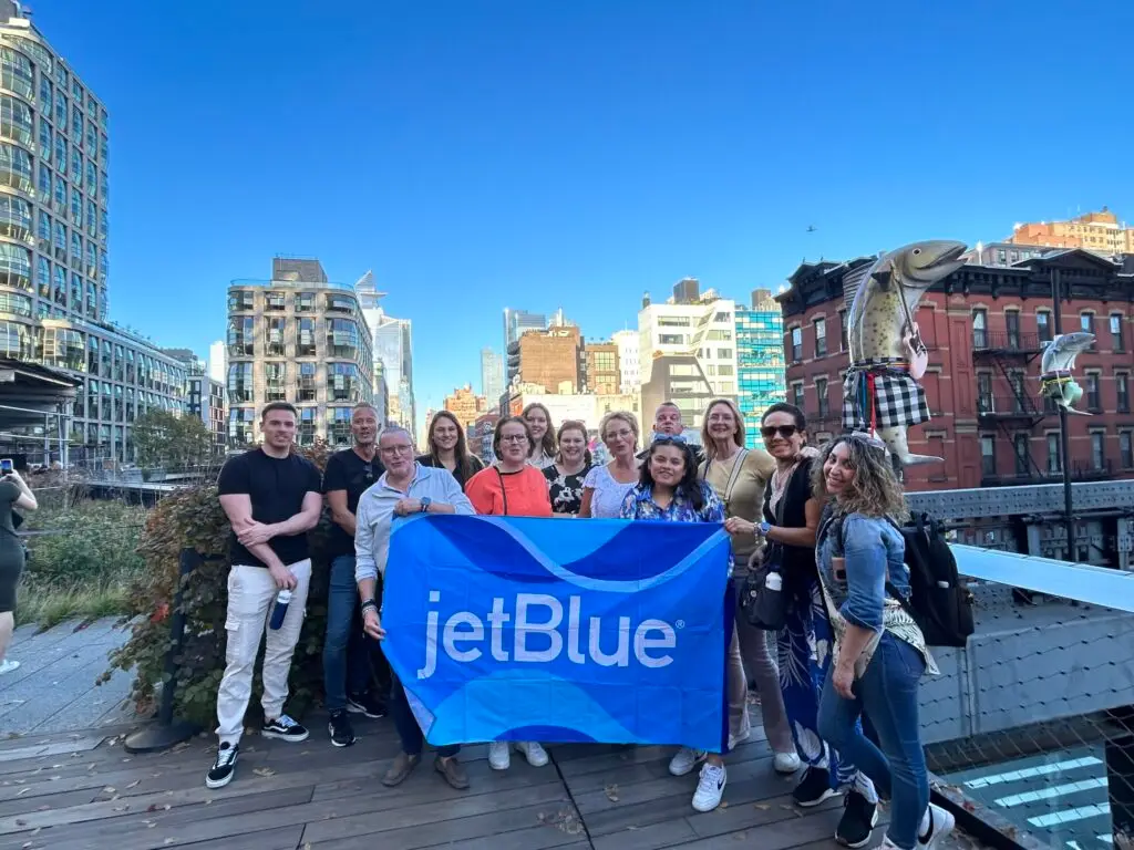 a group of people standing in front of a building