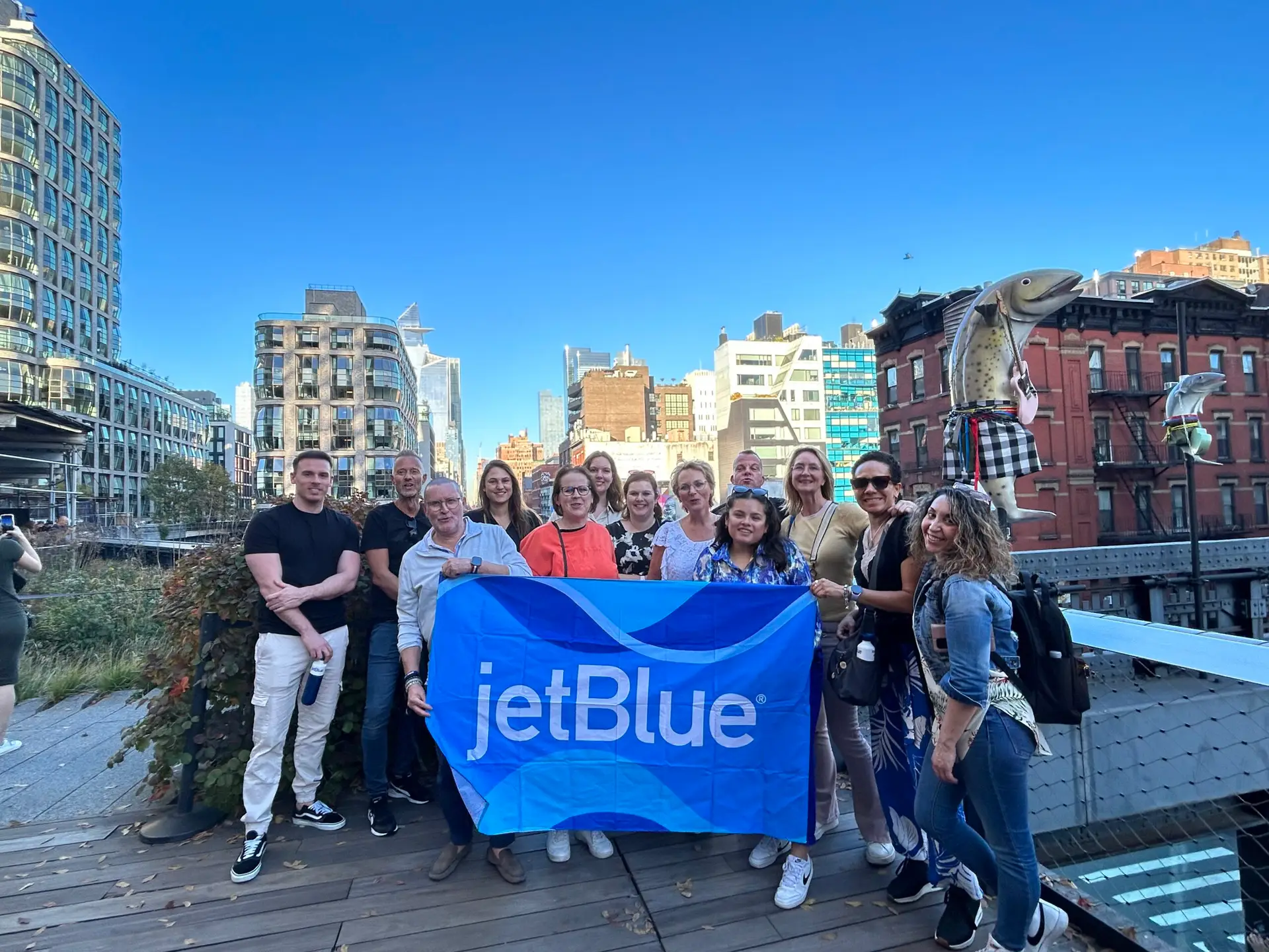 a group of people standing in front of a building