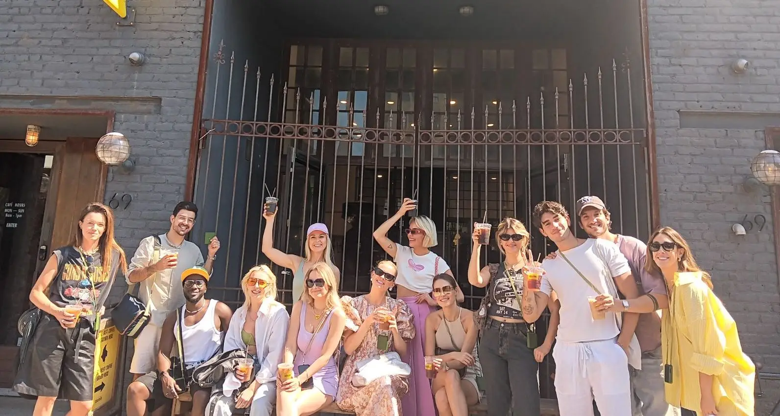 a group of people standing in front of a building
