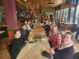 a group of people sitting at a table in Ignazios in DUMBO.