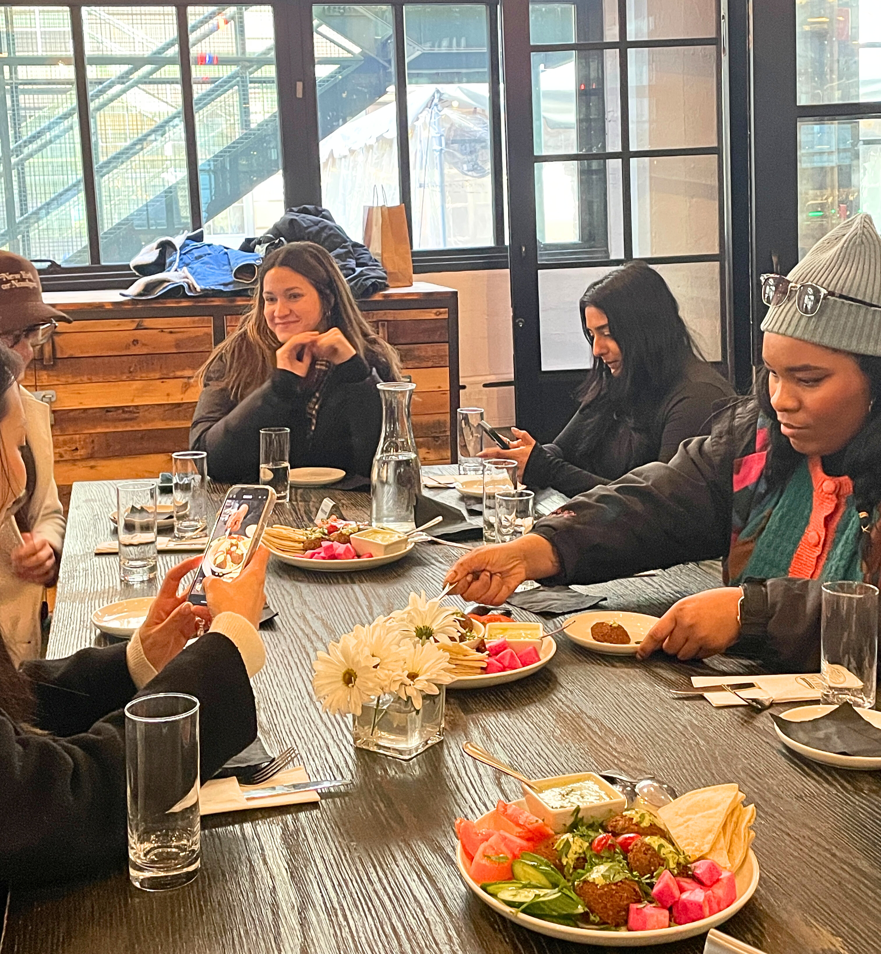 group enjoying Mediterranean food