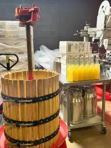 a close up of a barrel and bottles