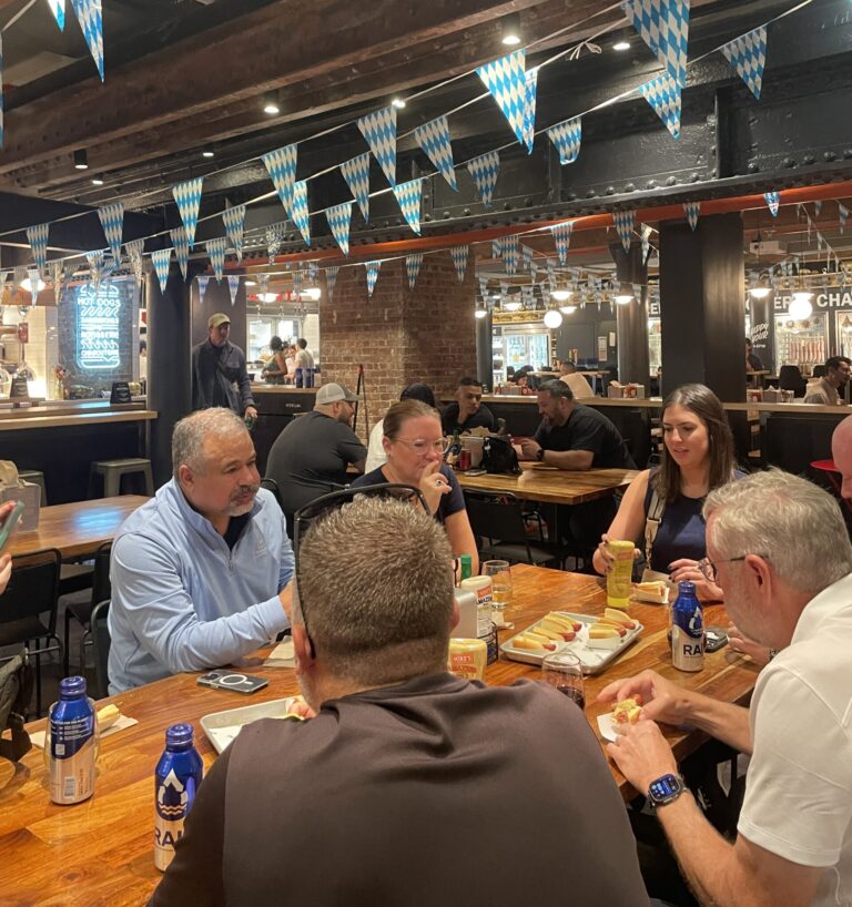 corporate dinner at dickson's, eating hot dogs