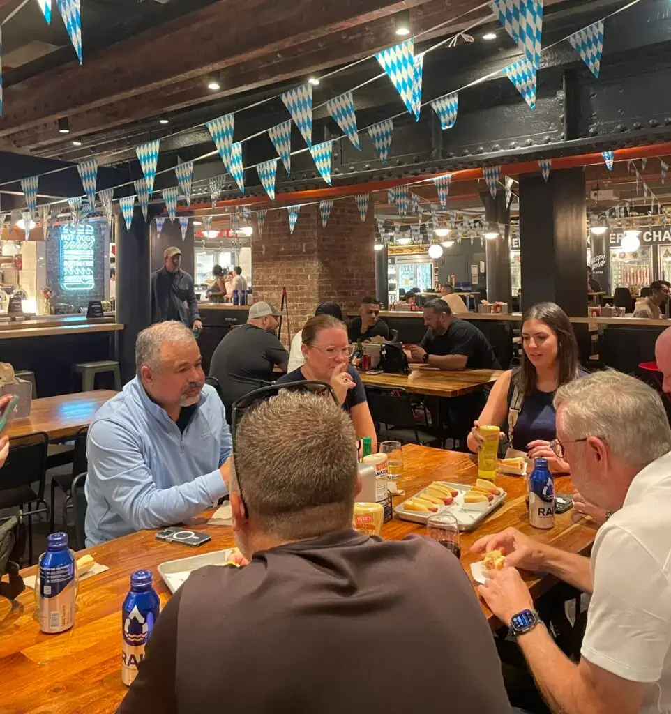 corporate dinner at dickson's, eating hot dogs