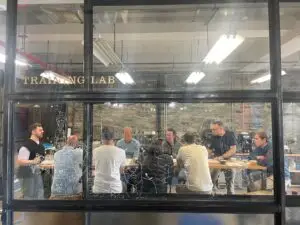 Like A Local Tours group at a coffee tasting in a Red Hook roastery