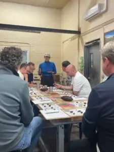 Guests tasting single-origin chocolate at Raaka Chocolate factory in Red Hook