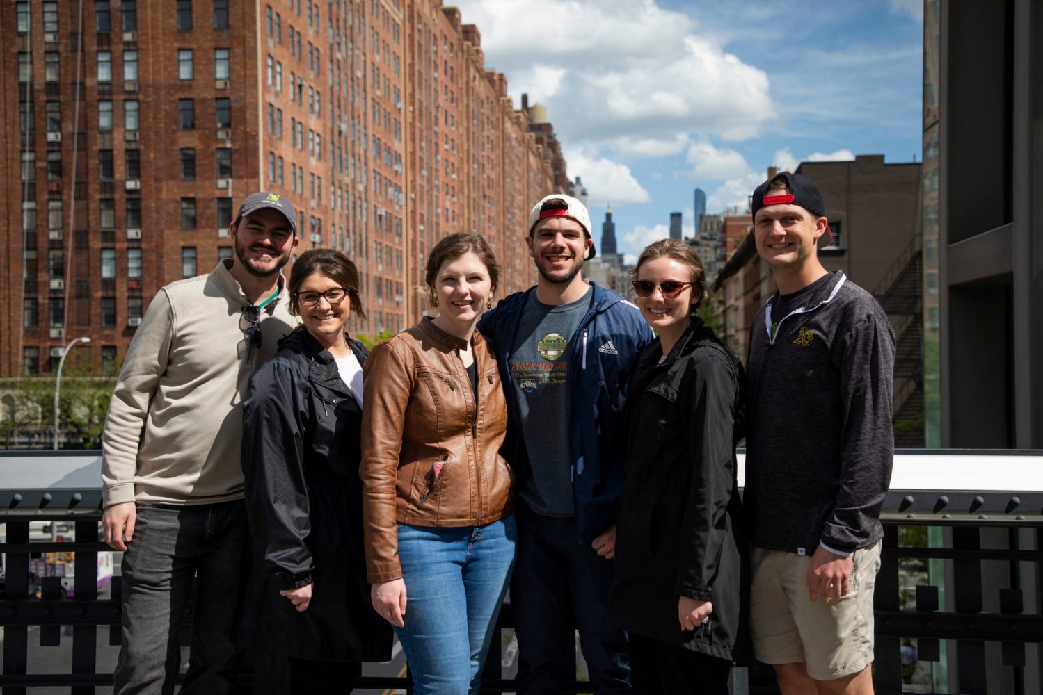 a group of people standing in front of a building