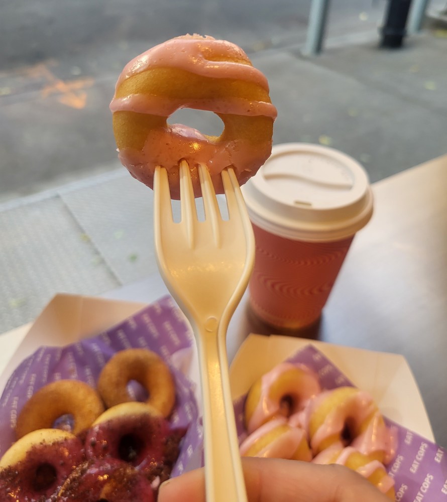 a donut and a cup of coffee